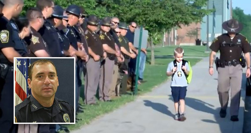 เจ้าหน้าที่ตำรวจ 70 นายมาส่งเด็กชายที่โรงเรียน เพราะพ่อของเขา ‘เสียชีวิตในหน้าที่’
